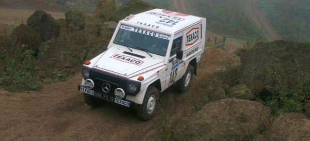 Auf dem Heißen Stuhl des Paris-Dakar Rallye-G-Modells von Jacky Ickx: Mercedes-Benz 280 GE Paris-Dakar Replika: Jacky Ickx (1983) 
